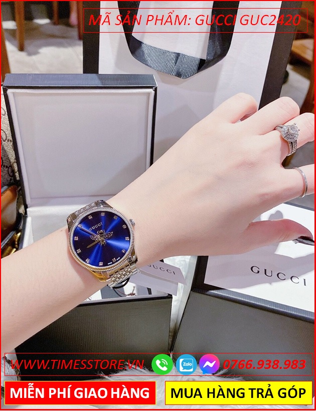 dong-ho-nu-gucci-timeless-mat-tron-xanh-day-kim-loai-timesstore-vn