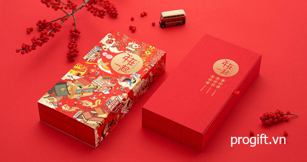 Hộp giấy đựng quà Tết với thiết kế chợ xuân nhộn nhịp