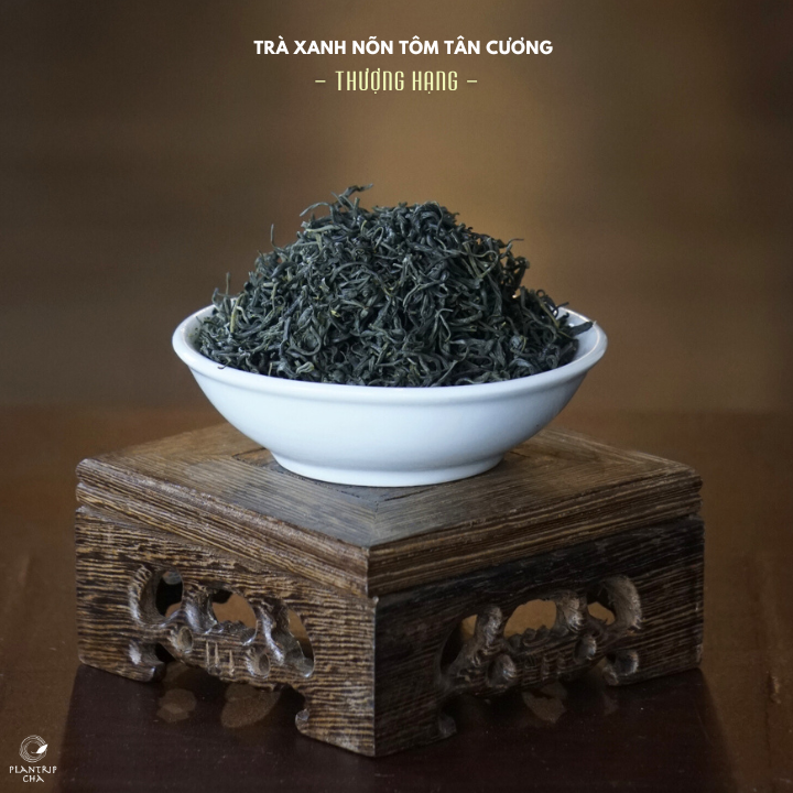 Hình dáng lá trà khô của Trà Xanh Nõn Tôm Tân Cương Thượng Hạng.