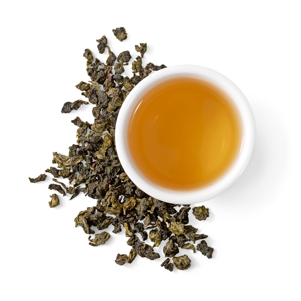 Không như những loại Oolong khác, trà Oolong Đỏ cho ra nước trà màu vàng đỏ, hơi giống màu hồng trà - Ảnh: Sưu tầm