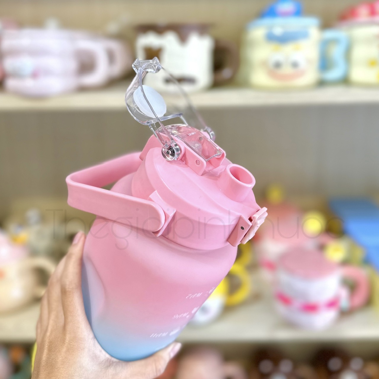 Bình Nhựa Nhắc Uống Nước Thể Tích 2Lit