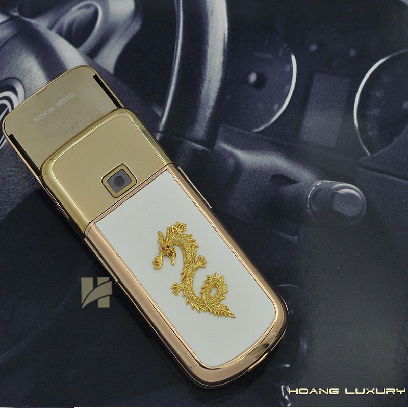 Tinh hoa hội tụ trong Nokia 8800 vàng hồng da trắng đính rồng Tinh hoa hội tụ trong Nokia 8800 vàng hồng da trắng đính rồng