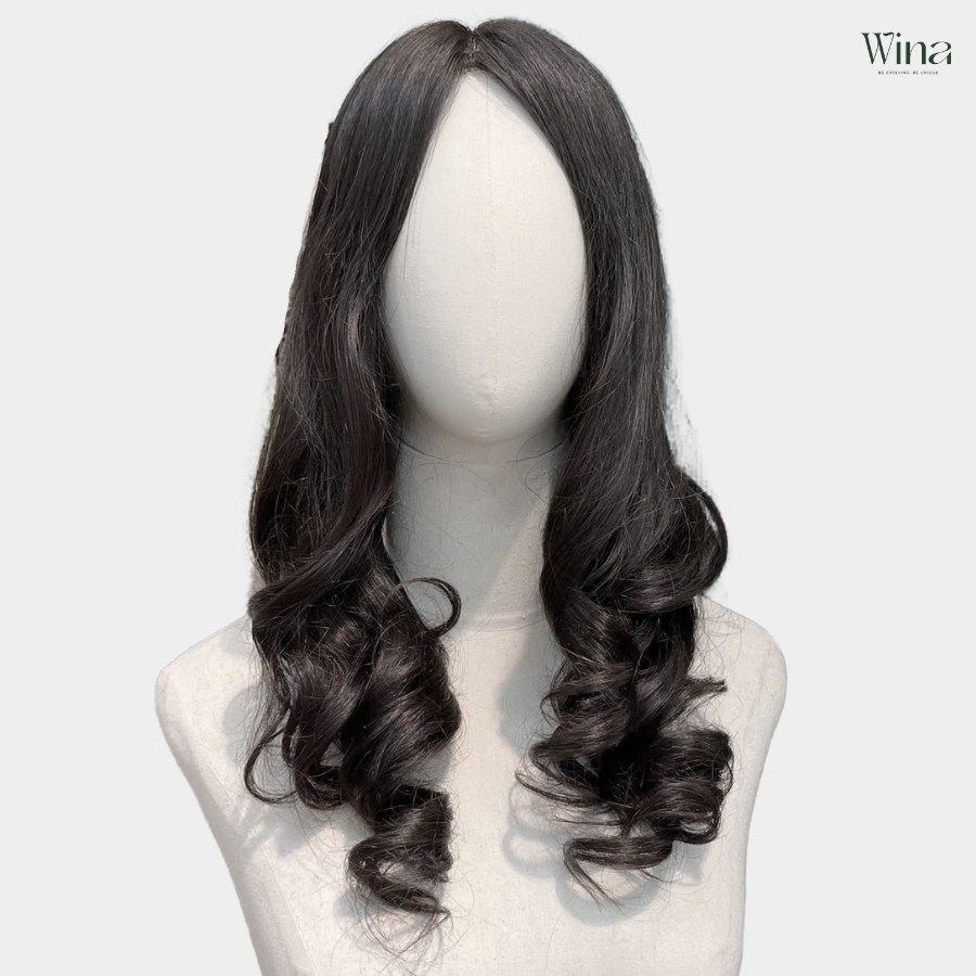 Các kiểu tóc uốn tuổi 50 này không chỉ giúp khuôn mặt trông thon gọn hơn mà còn mang đến vẻ trẻ trung