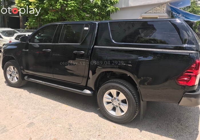 Xe Hilux lắp nắp thùng cao không đèn kính liền giá rẻ
