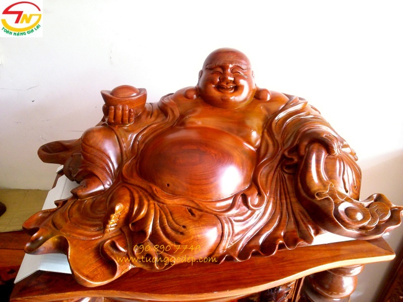Phật di lặc cầm vàng