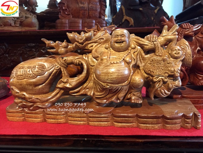 Phật Di Lặc kéo bao gỗ xá xị