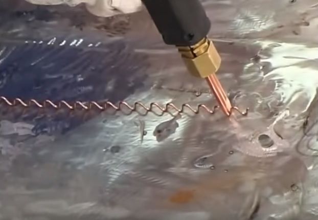 Lò xo hàn giật, Hàn lo xo lên vị trí cần hàn giật