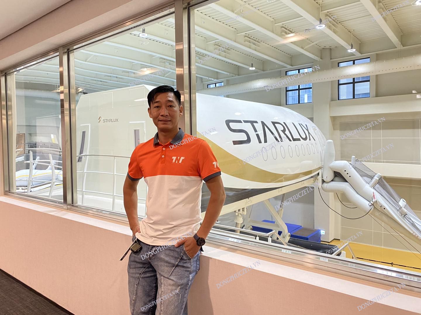 xưởng may đồng phục công ty tnt travel