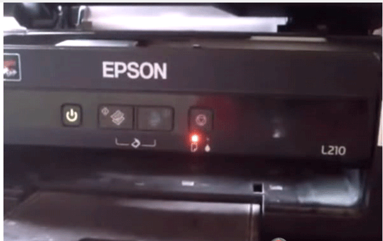 Máy in epson báo đèn đỏ ở hình tờ giấy