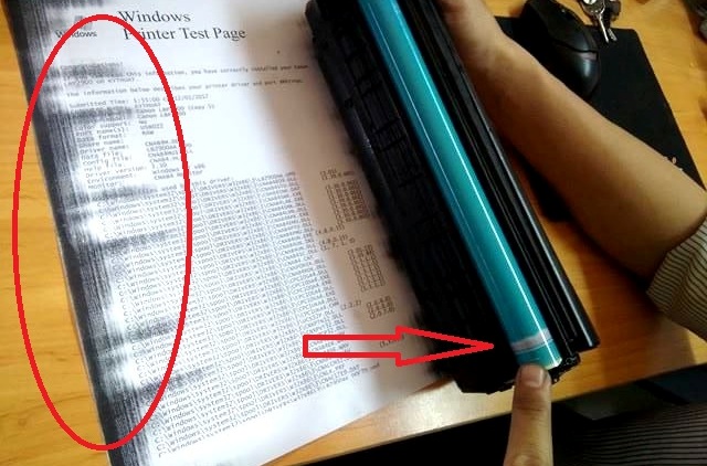 máy in ra bị đen mép