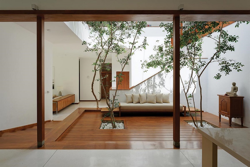 Kết hợp với các vật liệu tự nhiên như gỗ, gạch, cây xanh để tạo ra một không gian sống hài hòa và gần gũi