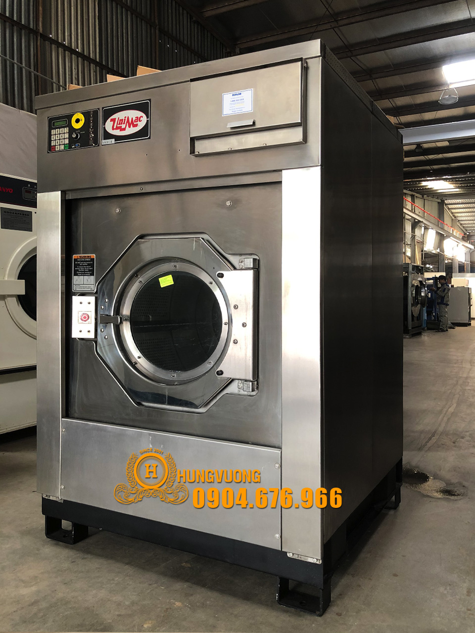 Mặt nghiêng máy giặt công nghiệp UNIMAC UX100, 45kg, chân chống rung, biến tần, Mỹ
