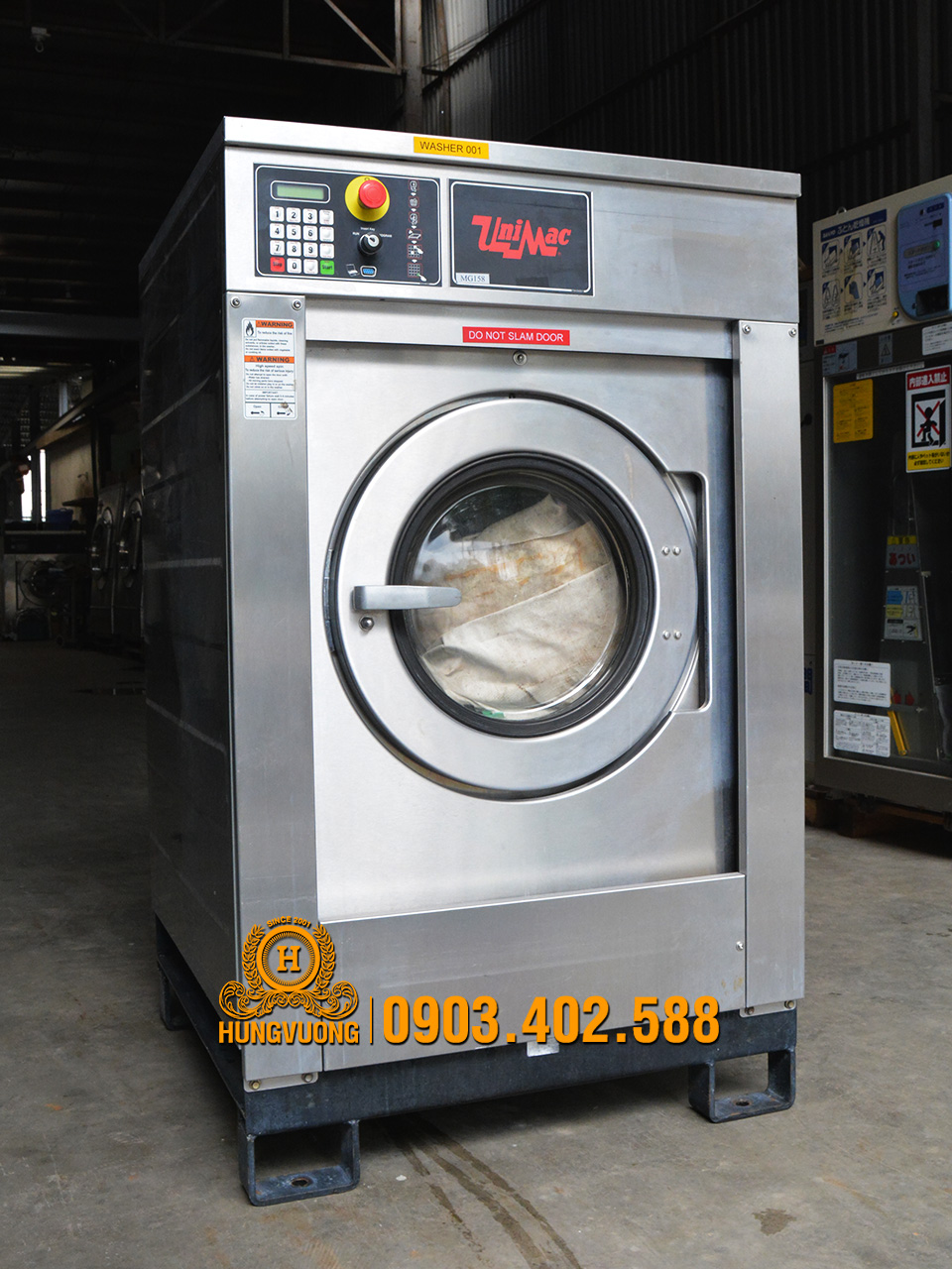 Mặt nghiêng máy giặt công nghiệp UNIMAC UX055LB, 23kg, chân chống rung, biến tần, Mỹ