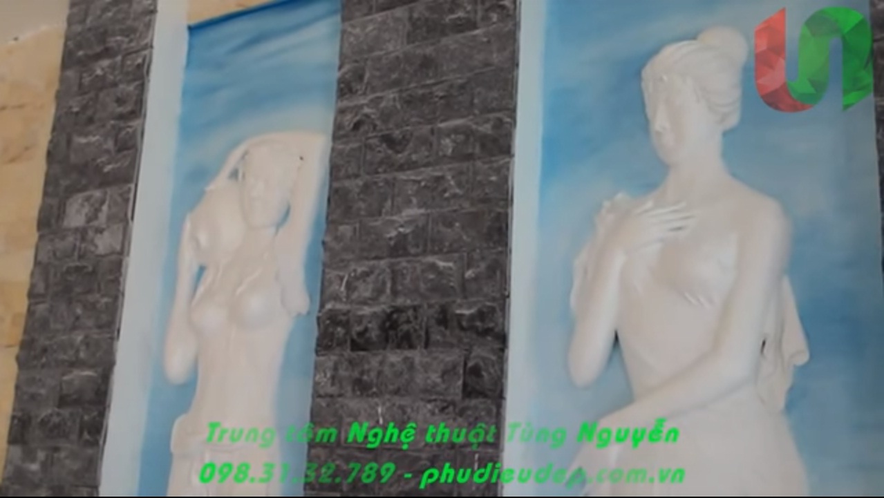 phù điêu thiếu nữ ôm bình