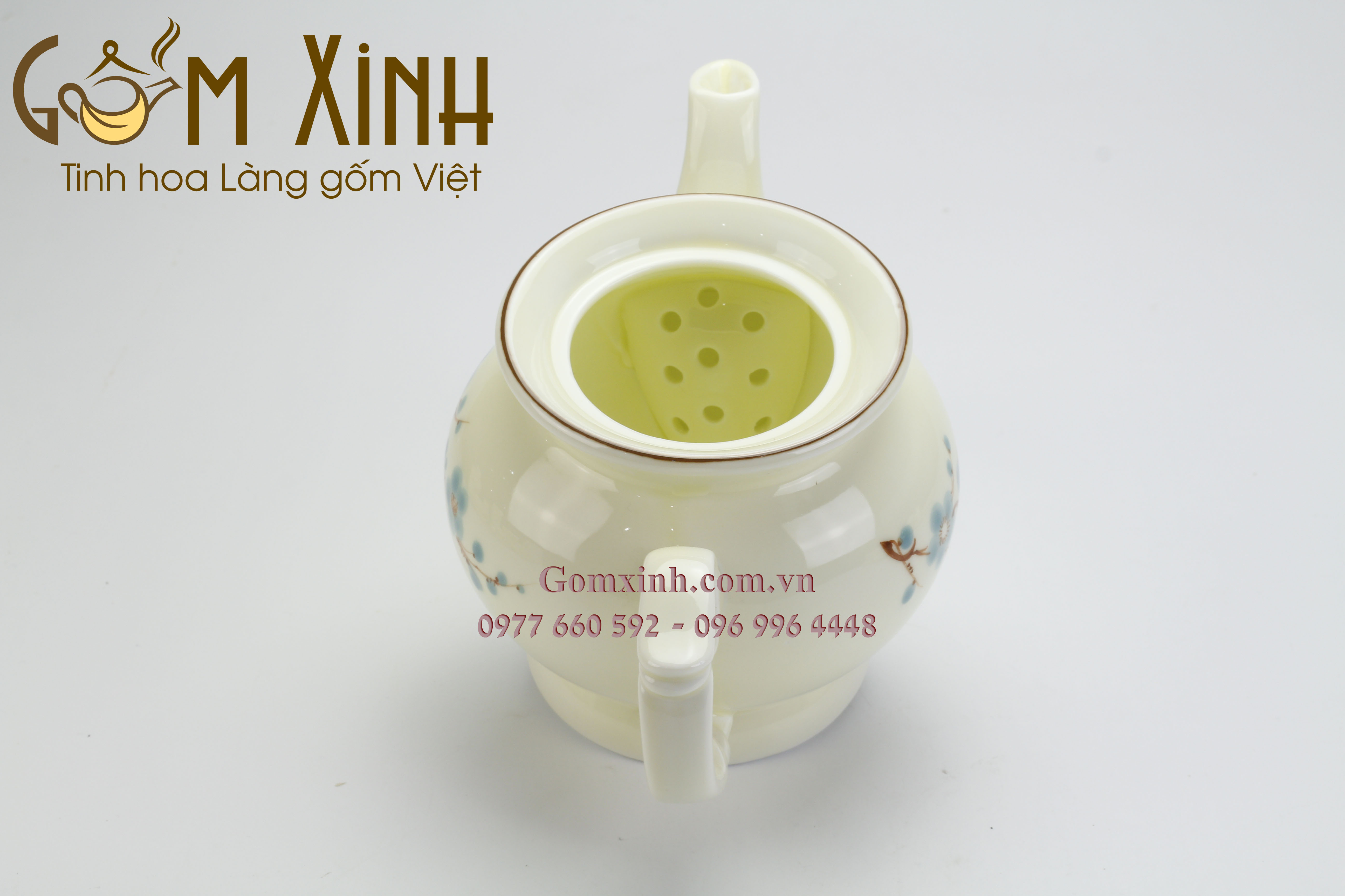 Bộ trà Phú Quý vẽ hoa đào xanh men kem