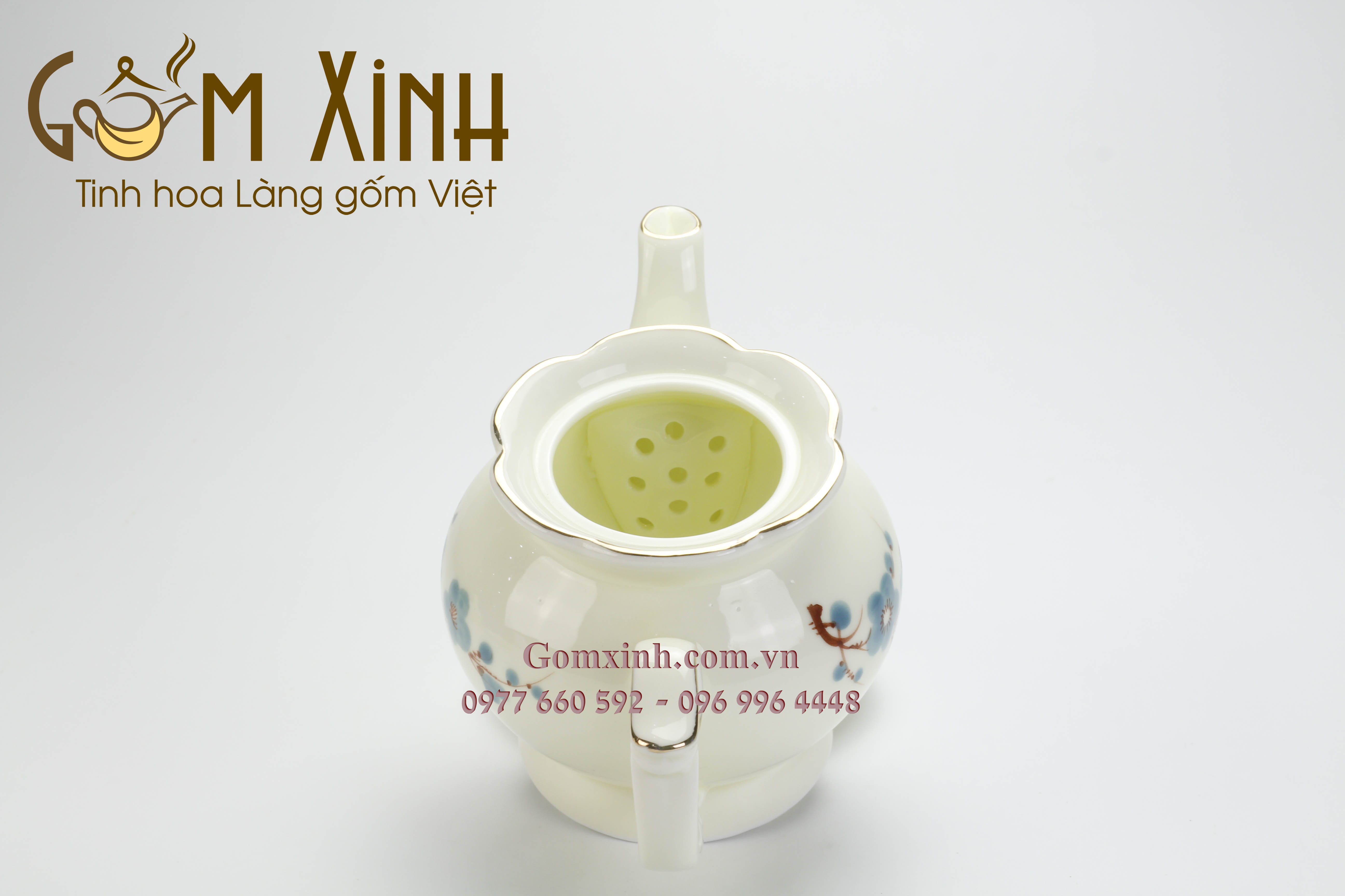 Bộ trà Phú Quý vẽ đào xanh men kem vàng kim