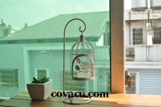 Chân nến hình lồng chim độc đáo