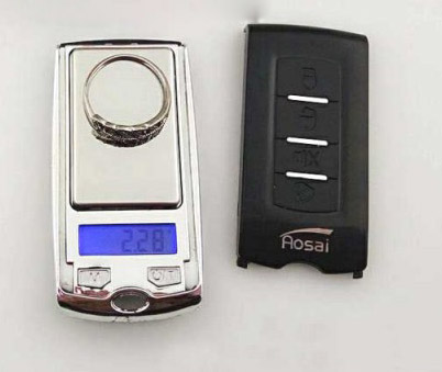 cân tiểu ly hình khóa bấm điều khiển