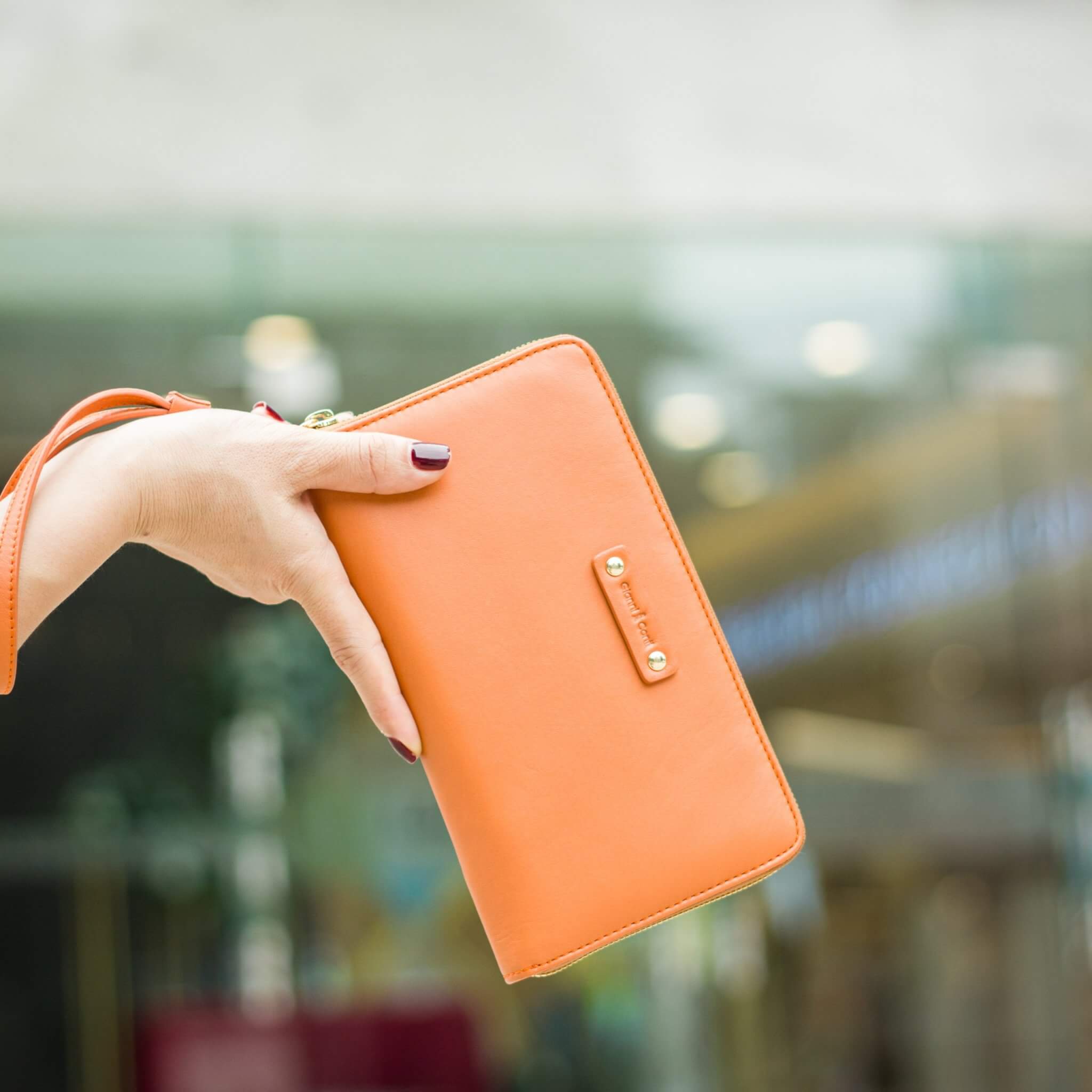 Ví cầm tay nữ màu cam