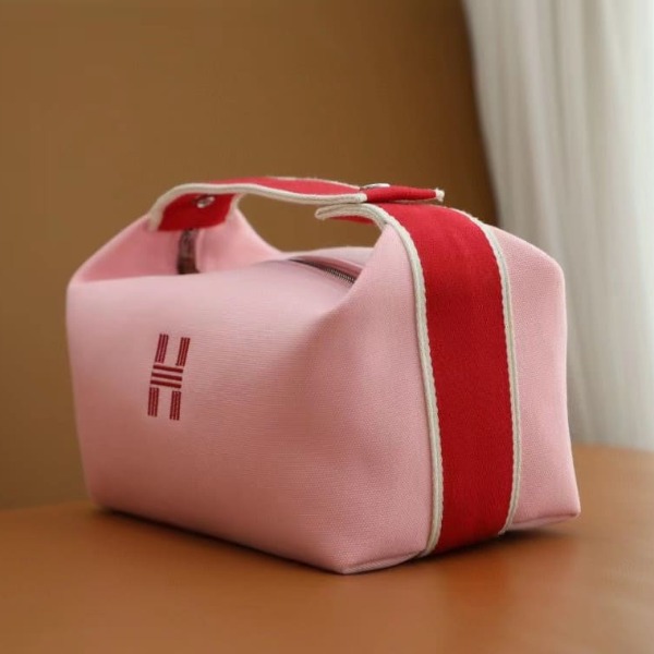 TÚI HERMES TROUSSE DE TOILETTE BRIDE A BRAC PM H MÀU HỒNG