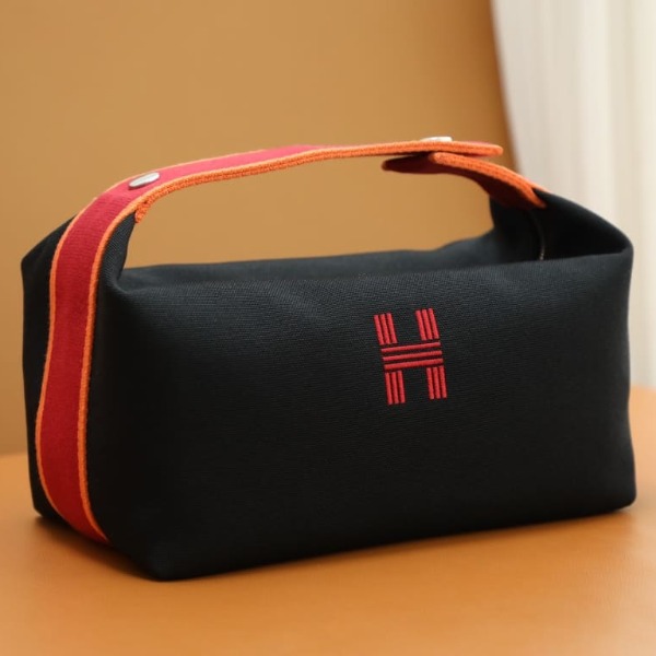TÚI HERMES TROUSSE DE TOILETTE BRIDE A BRAC PM H MÀU ĐỎ