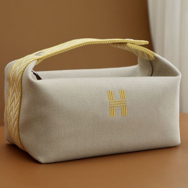 TÚI HERMES TROUSSE DE TOILETTE BRIDE A BRAC PM H MÀU VÀNG