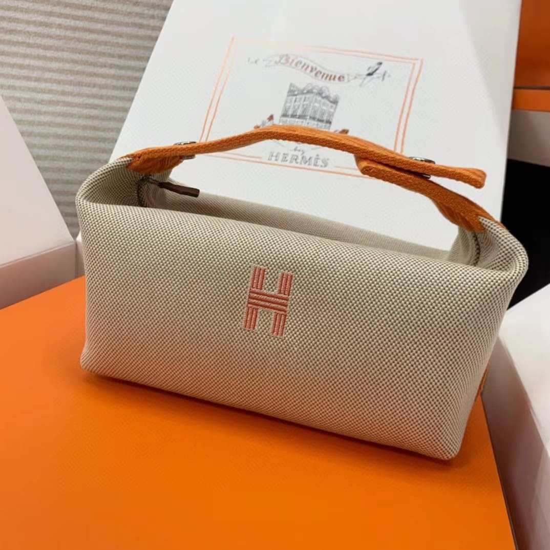 TÚI HERMES TROUSSE DE TOILETTE BRIDE A BRAC PM H MÀU CAM