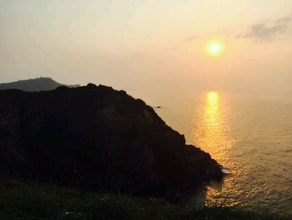 binh-minh-tren-bien-co-to