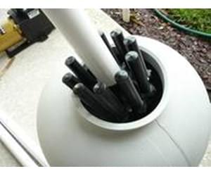 đặt ống và hệ thống lưới chặn vào trong bình