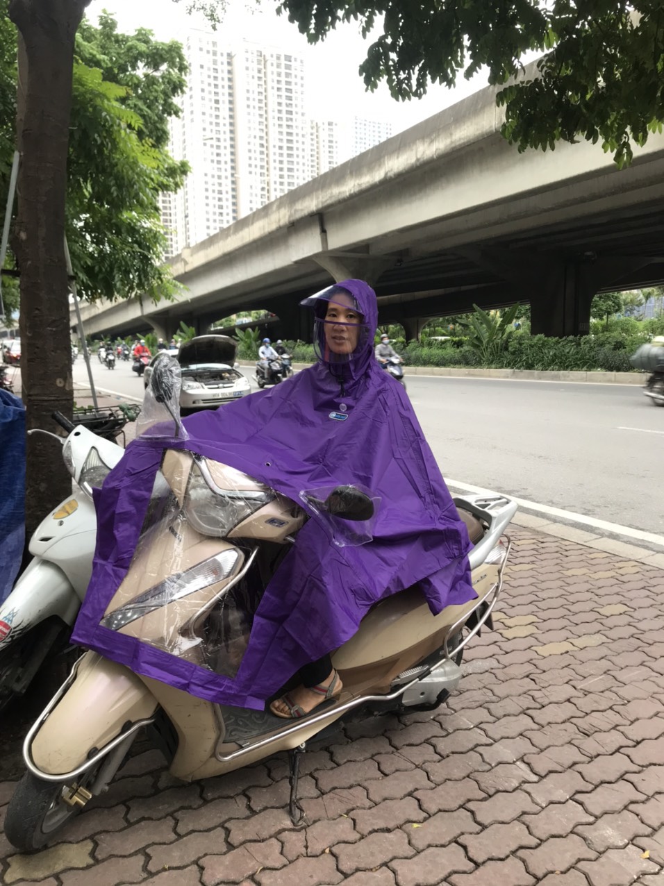 Áo mưa K26- khi đi xe máy