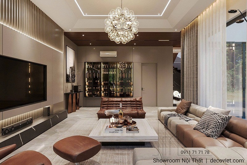 Thiết kế nội thất phòng khách với điểm nhấn là kệ TV âm tường.