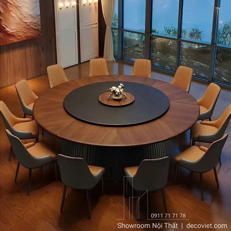 Mẫu bàn ăn tròn mặt gỗ hiện đại mang đến vẻ đẹp sang trọng và ấm cúng cho không gian phòng ăn.