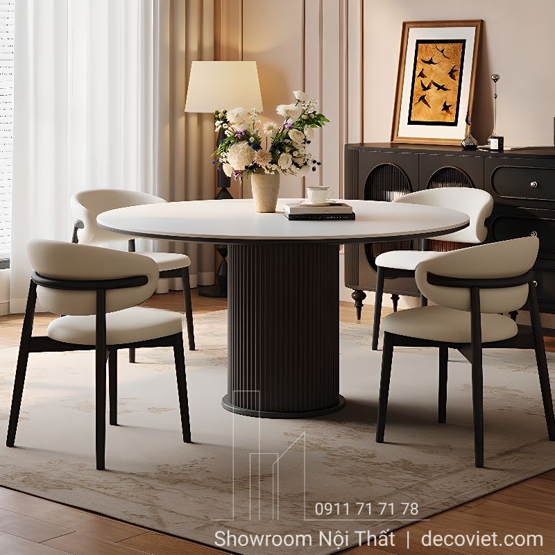 Bàn ăn tròn mặt đá kết hợp chân gỗ, thiết kế hiện đại và tinh tế.