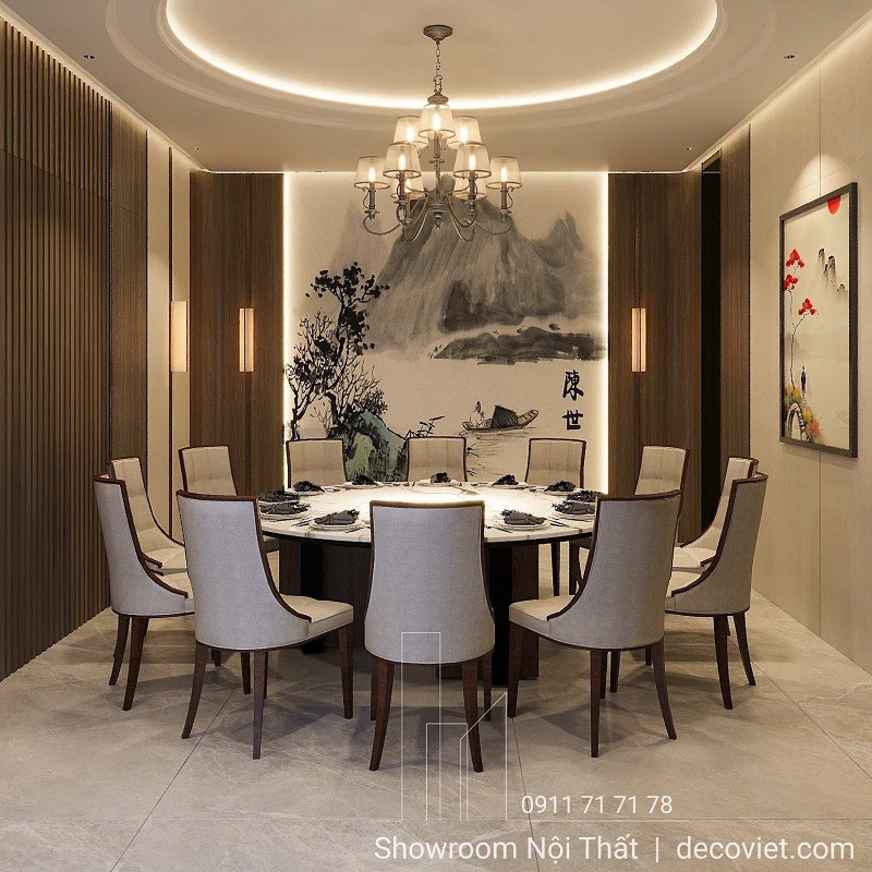 Bàn ăn tròn mặt đá với đường kính 1m8 phù hợp cho 10–12 người.