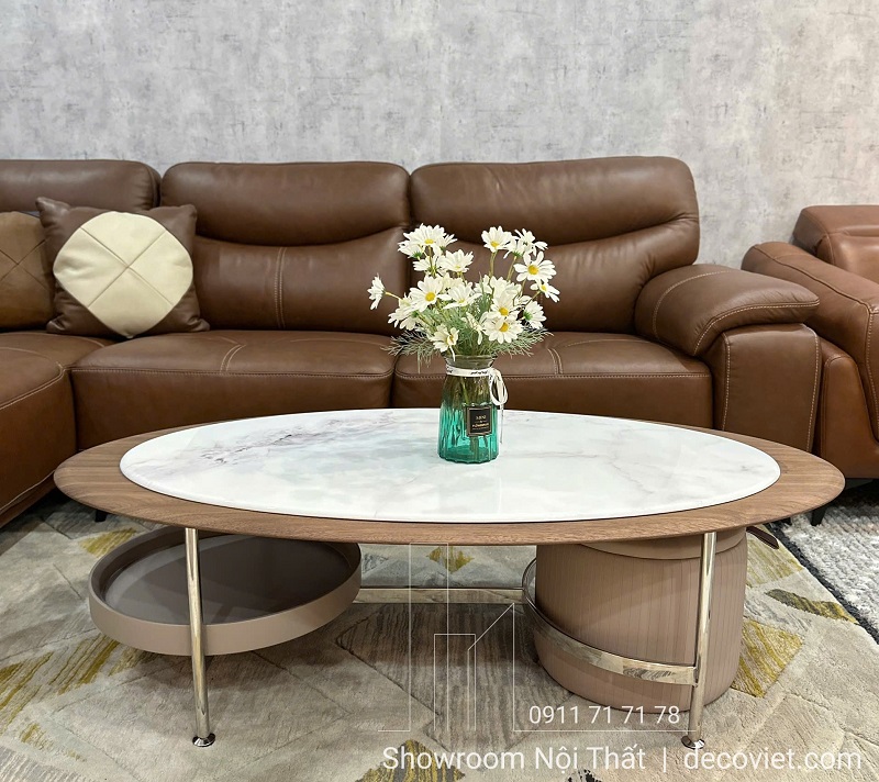 bàn trà phòng khách mặt đá bo cong kiểu dáng oval phối sofa da cao cấp