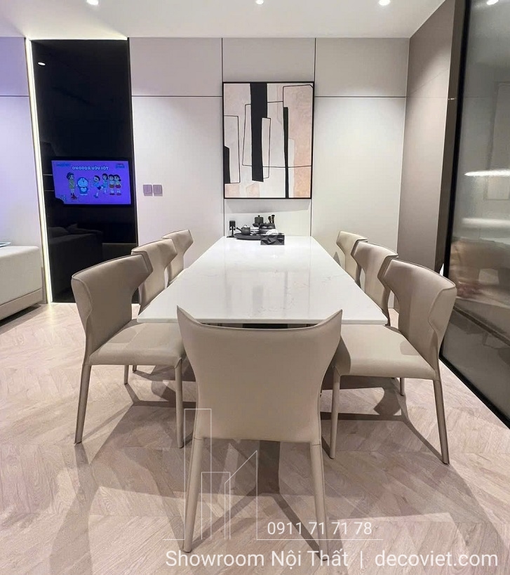 Bàn ăn 8 ghế mặt đá trắng sang trọng, thiết kế thanh lịch phù hợp cho phòng ăn hiện đại.