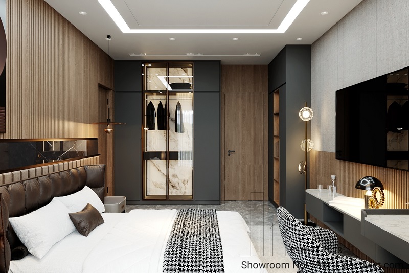 Bố cục hợp lý với tủ áo, bàn trang điểm và hệ kệ chức năng.