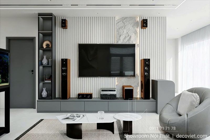 Kệ tivi âm tường và vách trang trí tạo điểm nhấn cho không gian phòng khách sang trọng