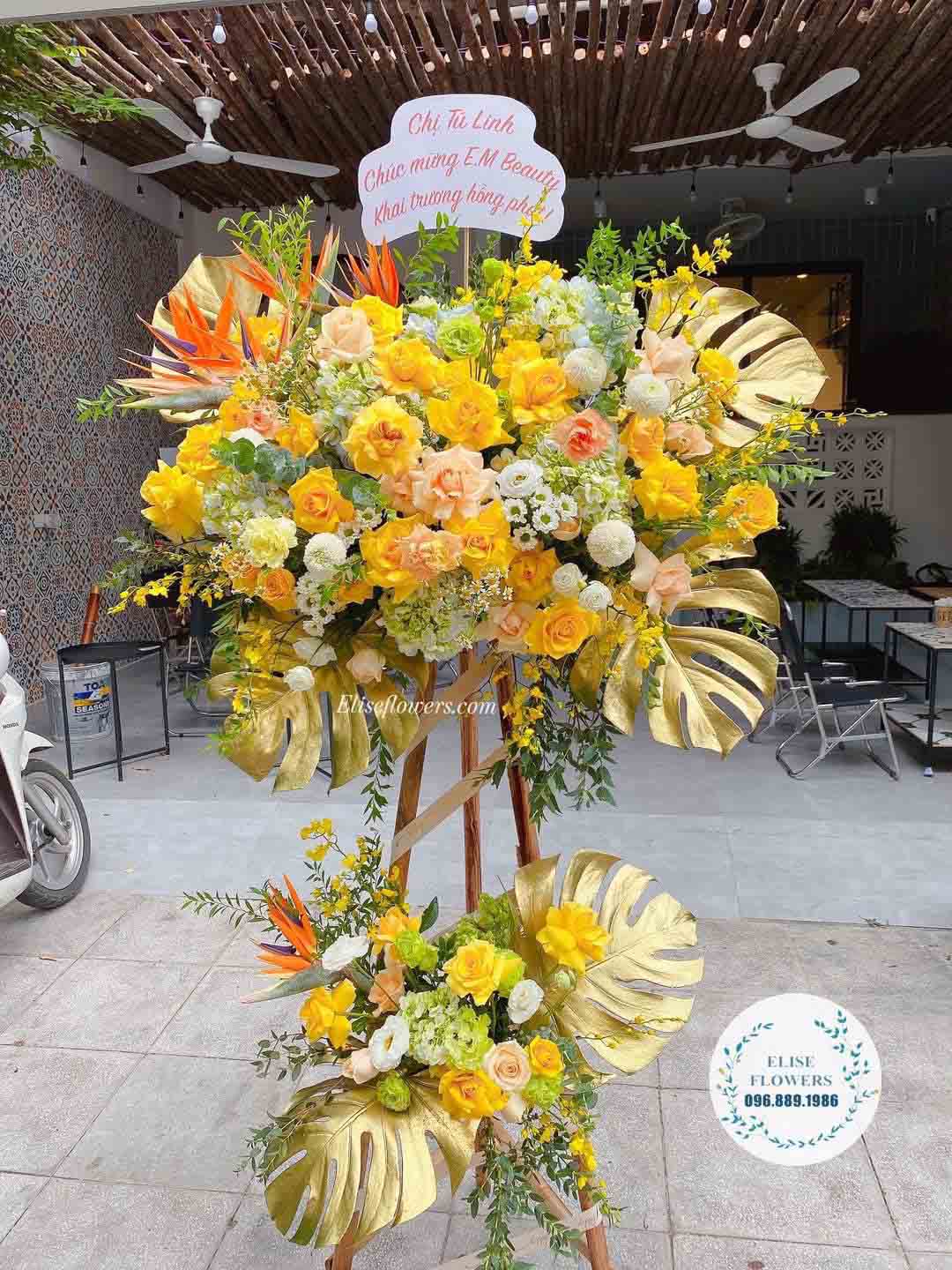 Hình ảnh kệ hoa chúc mừng khai trương màu vàng tài lộc | Kệ hoa 2 tầng chúc mừng khai trương | Hoa khai trương đẹp tại Eliseflowers