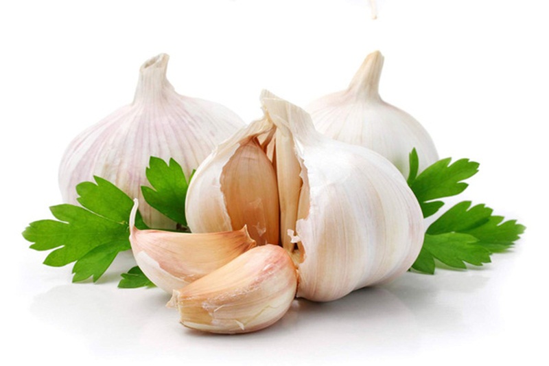 Bài thuốc trị mỡ máu cao bằng chanh gừng tỏi