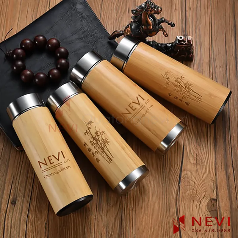 dịch vụ cung cấp số lượng lớn bình nước vỏ tre và in khắc hình lên thân bình làm quà tặng cung cấp bởi Nevi