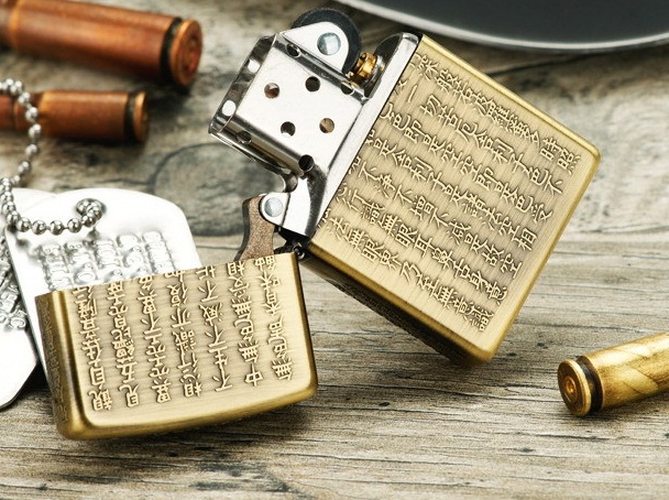 Zippo kinh phật dập nổi