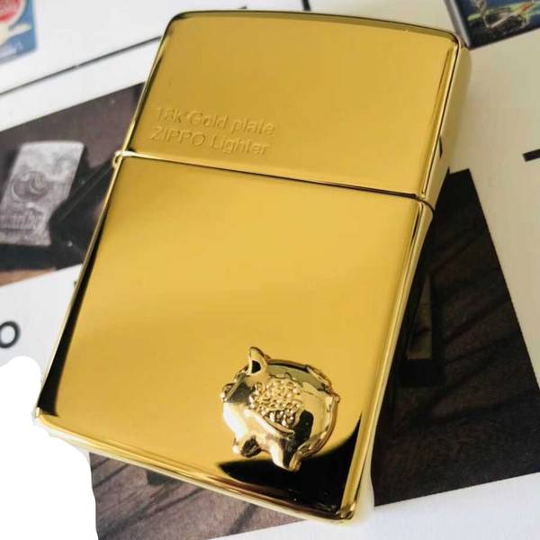 bán Zippo 18k mạ vàng mẫu heo hay mèo Nhật