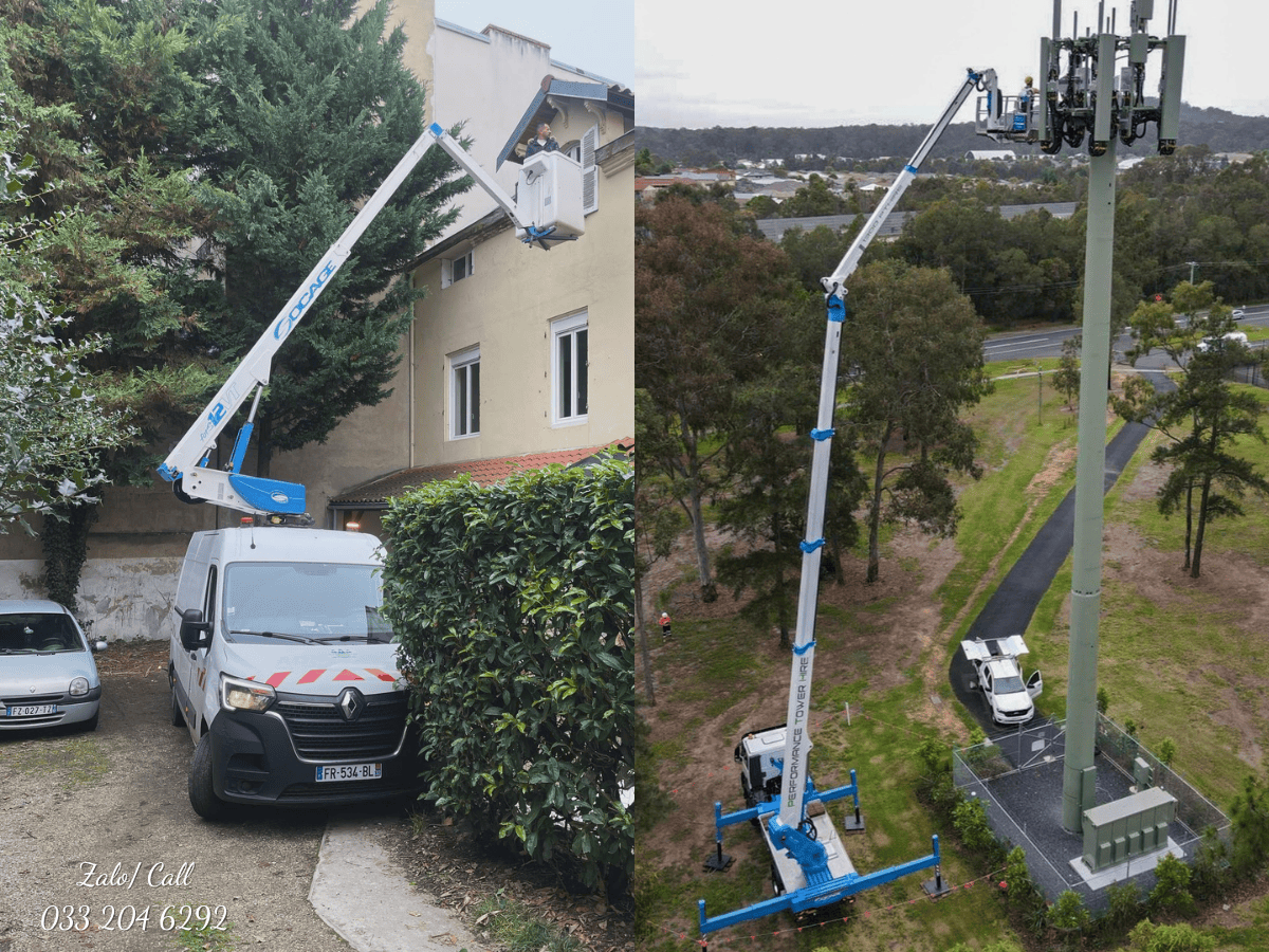 Xe ô tô nâng người Socage 14m đang vươn cần để công nhân sửa chữa hệ thống đèn đường trong một khu đô thị.