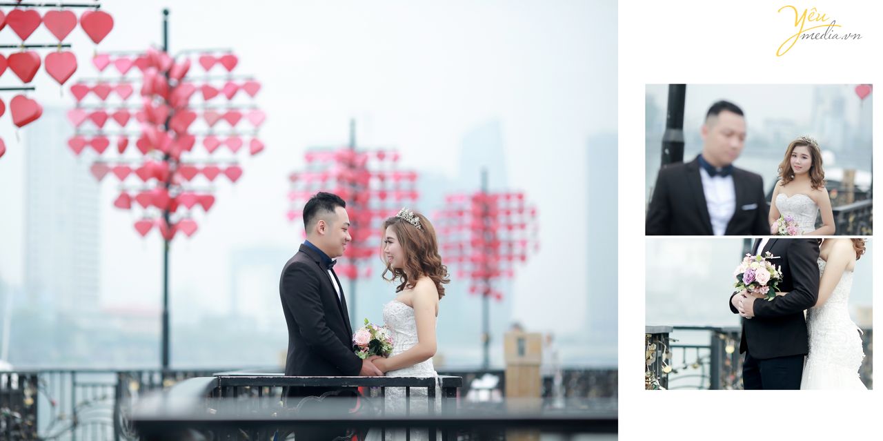 chú rể nắm tay ôm cô dâu trên cầu