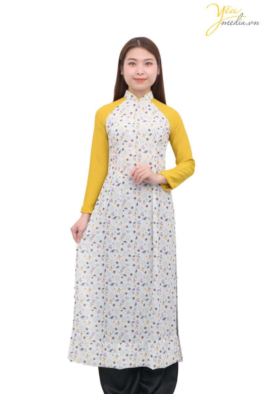 Áo dài 77 - một mẫu áo dài mới mẻ, trẻ trung của Yêu media được nhiều bạn trẻ từ 16-25 yêu thích. Mẫu áo dài tay - với phần ống tay màu vàng nổi bật, trên nền tà áo hoa xanh - vàng - trắng. Đây là mẫu áo sẽ giúp bạn tôn lên vẻ đẹp vừa nữ tính vừa hiện đại khi diện trên mình.