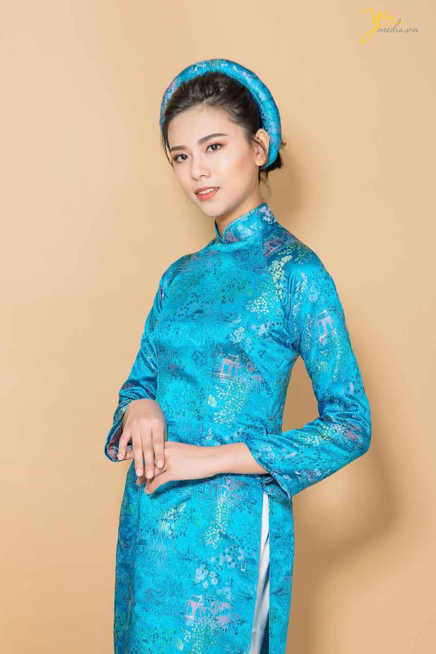 áo dài gấm màu xanh hoa chìm