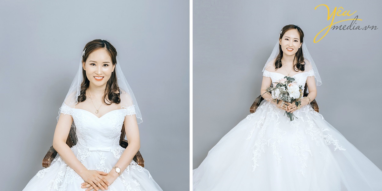 cô dâu xinh ngồi ghế mặc váy cưới chụp ảnh trong studio