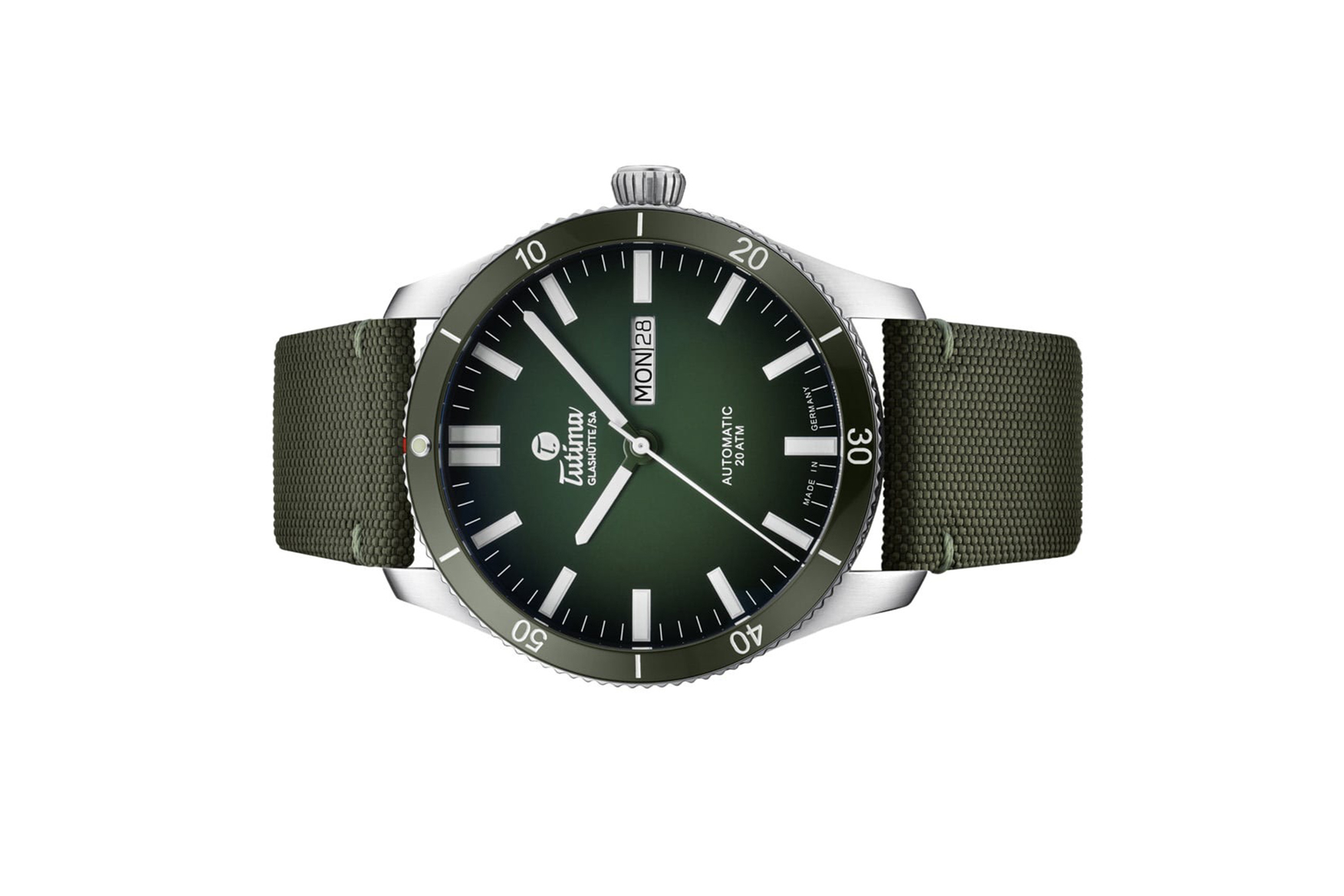 Đồng hồ đeo tay thương hiệu Tutima, dòng sản phẩm Grand Flieger Airport, Ref no: 6106-03, mặt số xanh lá Dégradé, size 43mm, máy tự động, vỏ đồng hồ bằng thép không gỉ và dây đeo vải Cordura®, hàng mới 100%