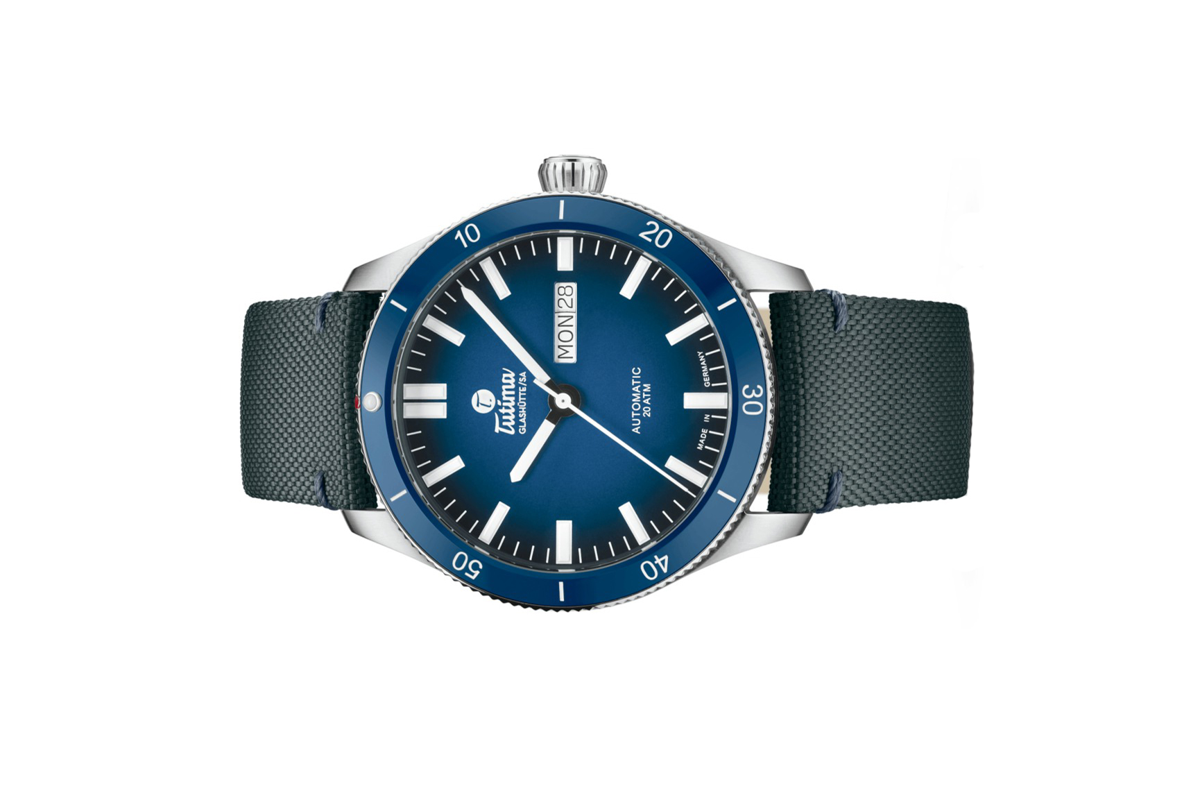 Đồng hồ đeo tay thương hiệu Tutima, dòng sản phẩm Grand Flieger Airport, Ref no: 6107-01, mặt số xanh dương Dégradé, size 41mm, máy tự động, vỏ đồng hồ bằng thép không gỉ và dây đeo vải Cordura®, hàng mới 100%